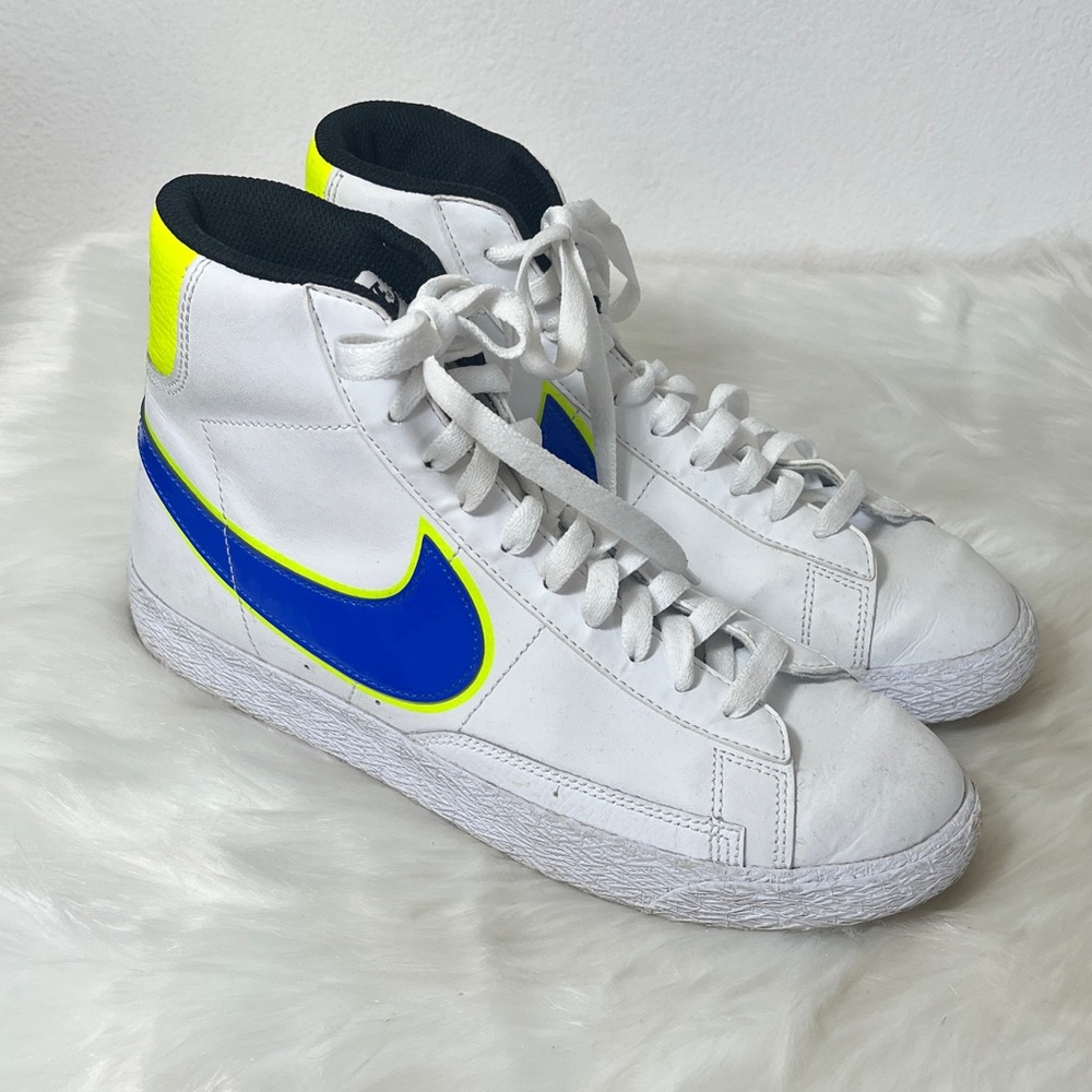 Nike White High Top Basketball Sneakers with Blue and Yellow Accents